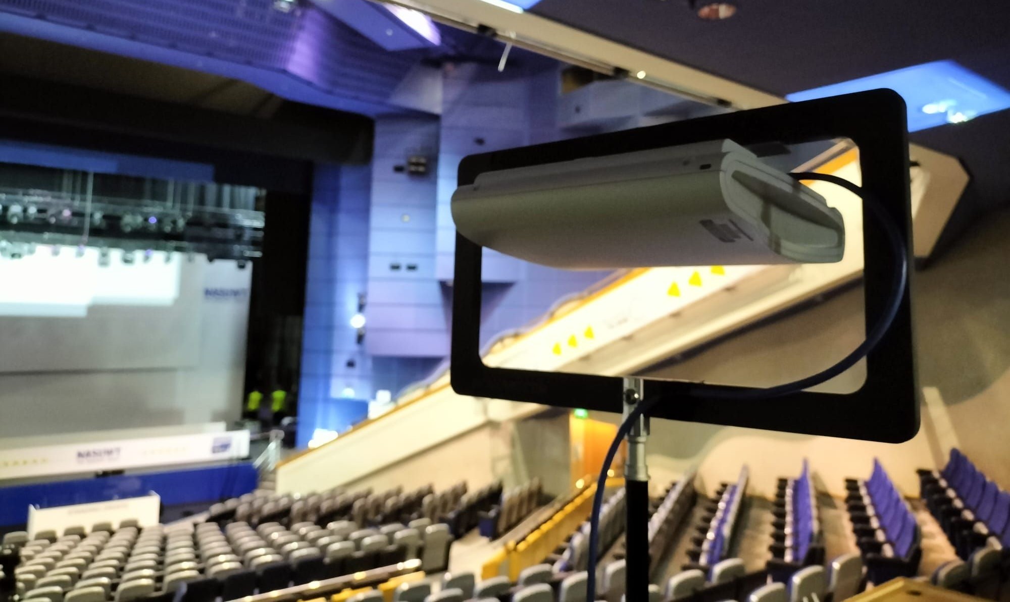 WiFi access point on a stand in a conference auditorium