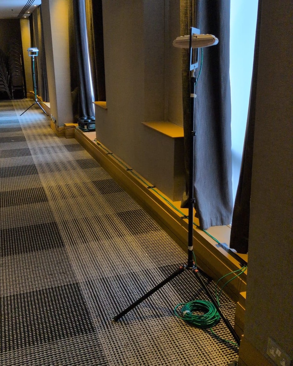 Wireless access points positioned along a hotel corridor