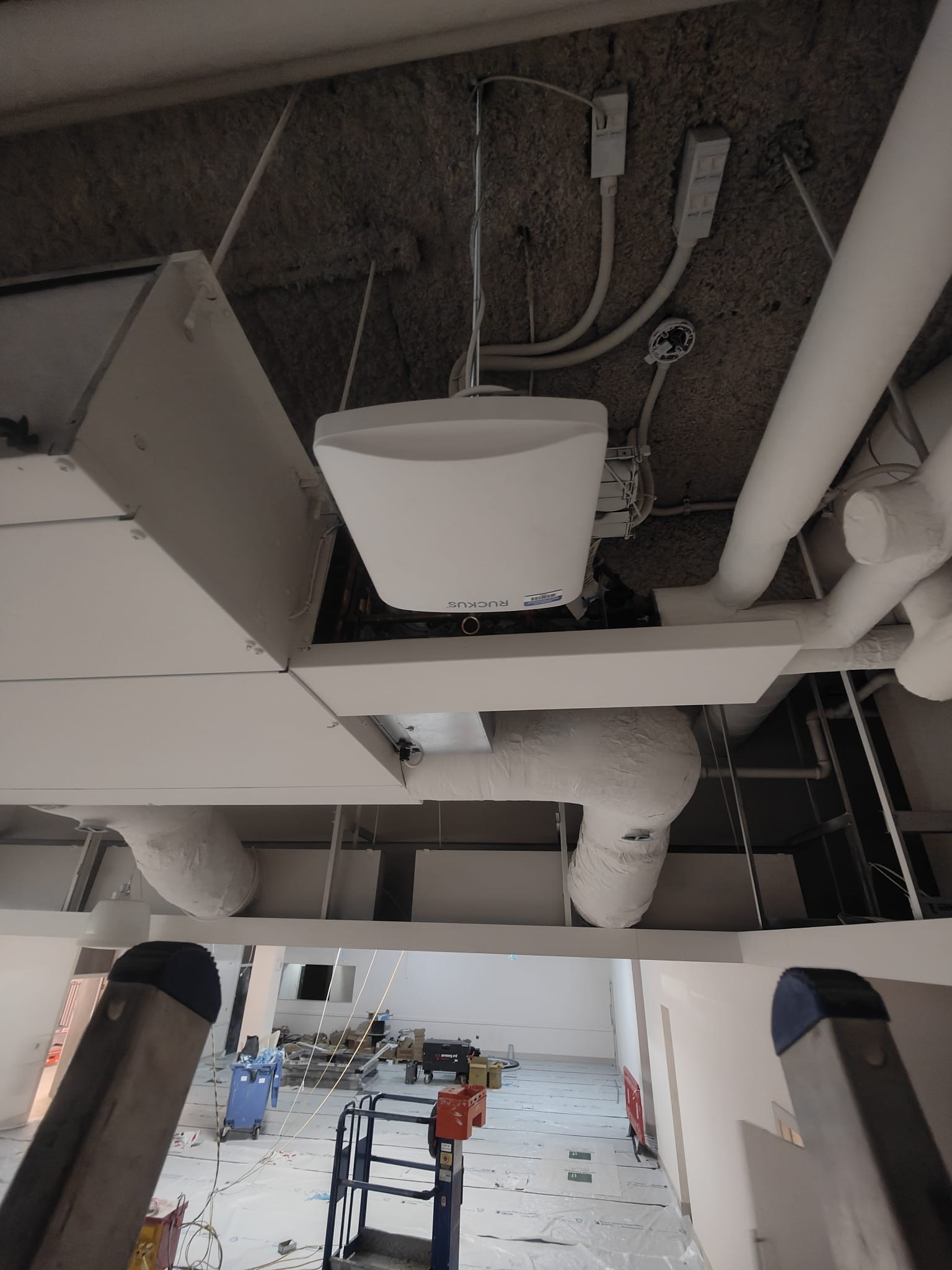 Wireless access point being installed on a ceiling