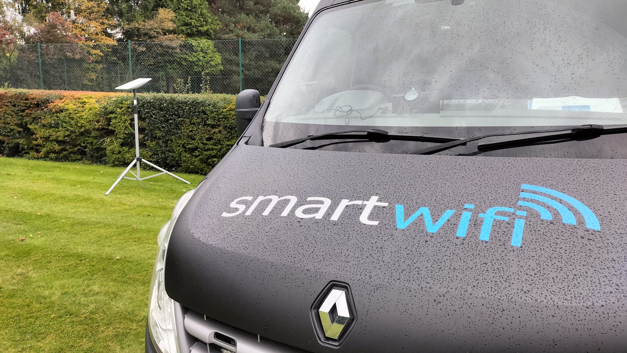 Connectivity van with satellite equipment mounted on its roof