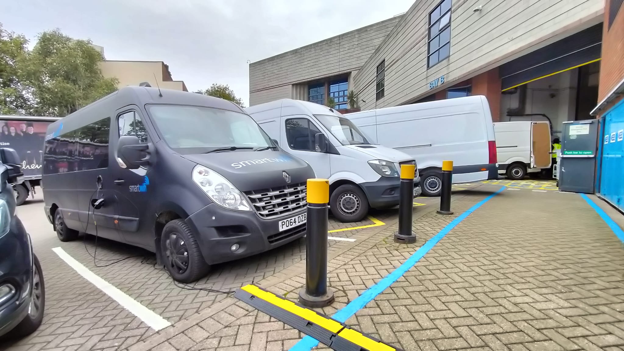 Connectivity van parked beside a venue loading dock