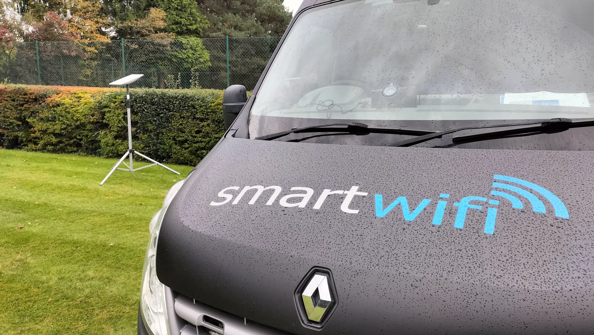 SmartWifi van with Starlink dish deployed on tripod